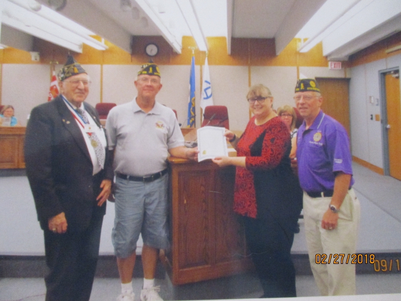 FALLDIN RECEIVING AN AMERICAN LEGION DAY PROCLAMATION FROM MAYOR SCHMITT OF COLUMBIA HEIGHTS