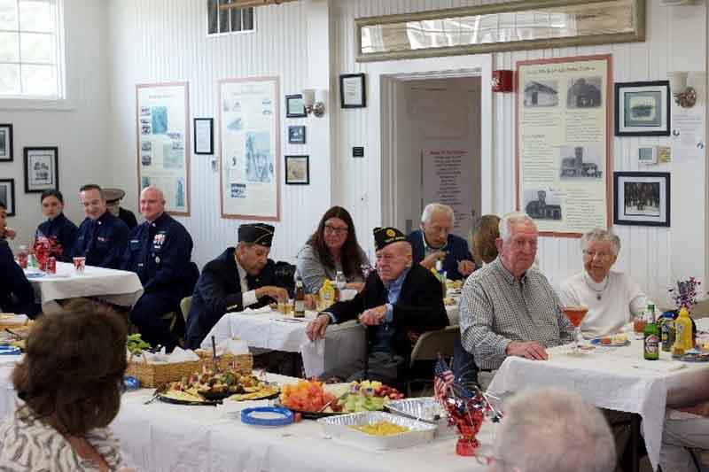 Reception for WWII Veterans and USCG Home for the Holidays Winners
