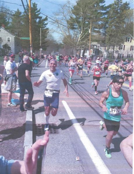 Tim Lamson runs in Boston Marathon