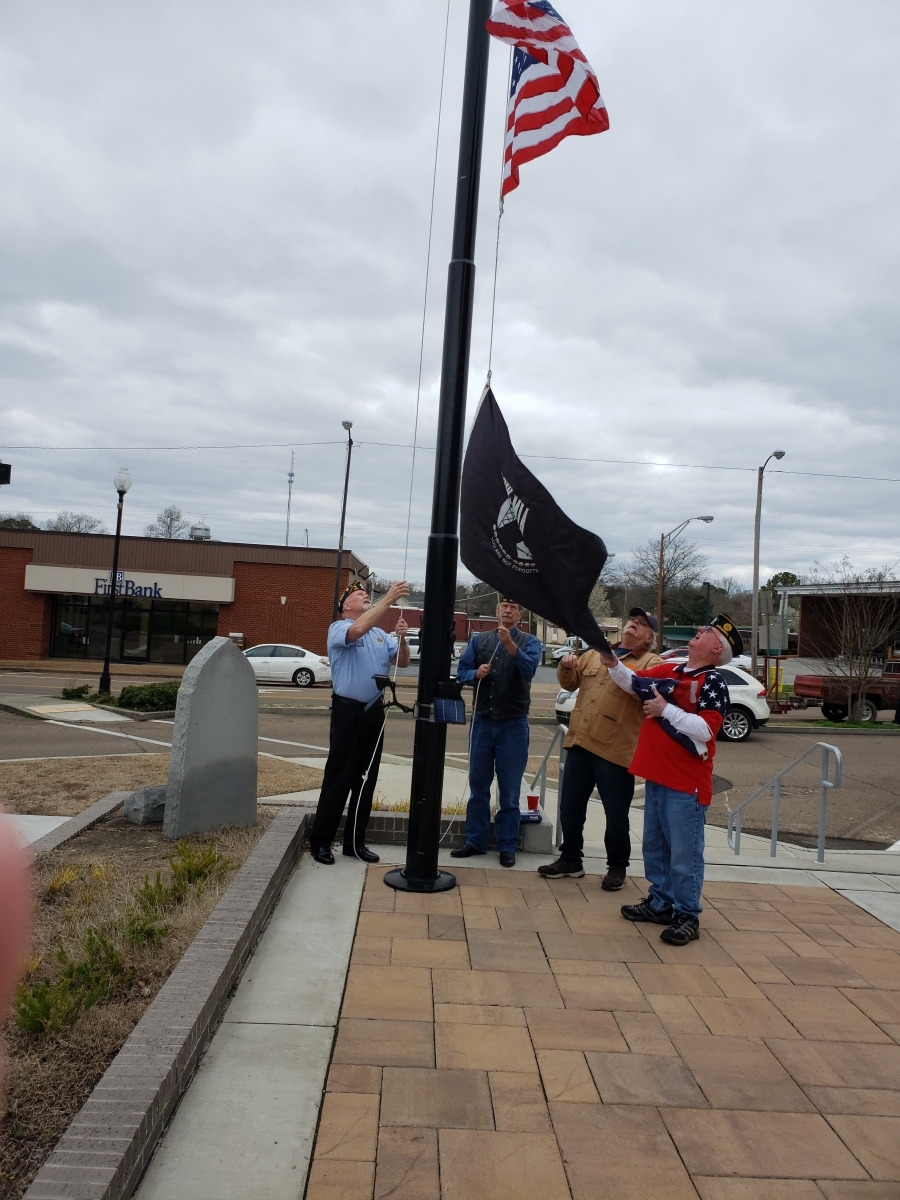 Veterans raise POW/MIA flag at courthouse