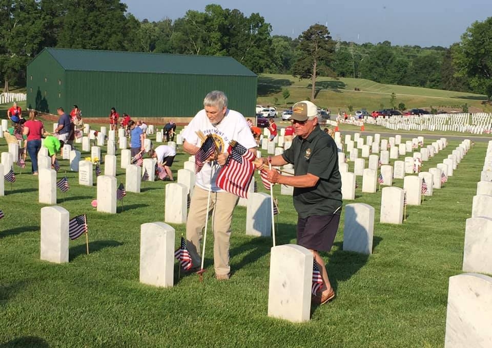 Placing Flags on Grave Markers at Salsbury NC VA Cemetery