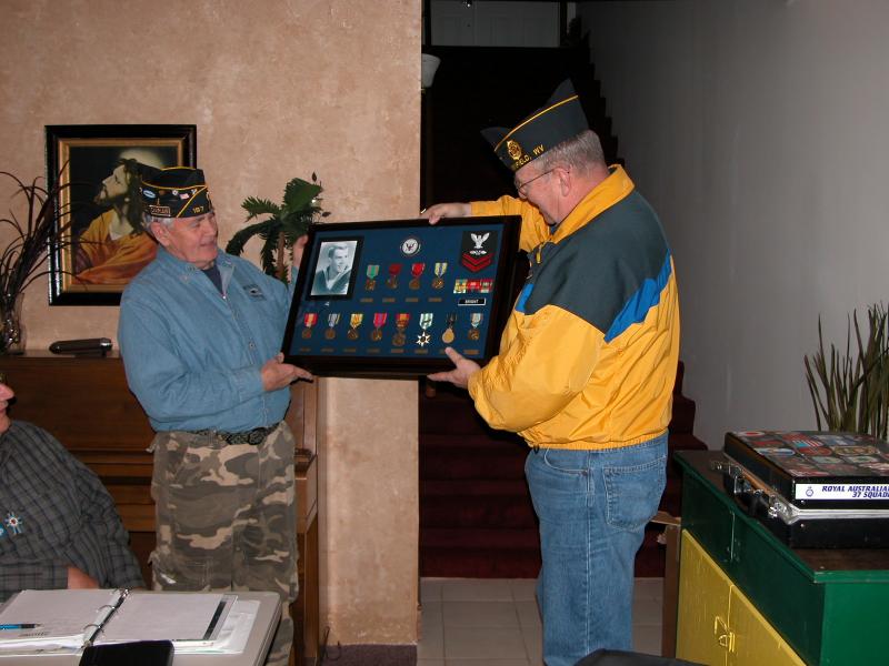 U. S. Navy Shadow Box Presented To Chaplain Kenny Bright