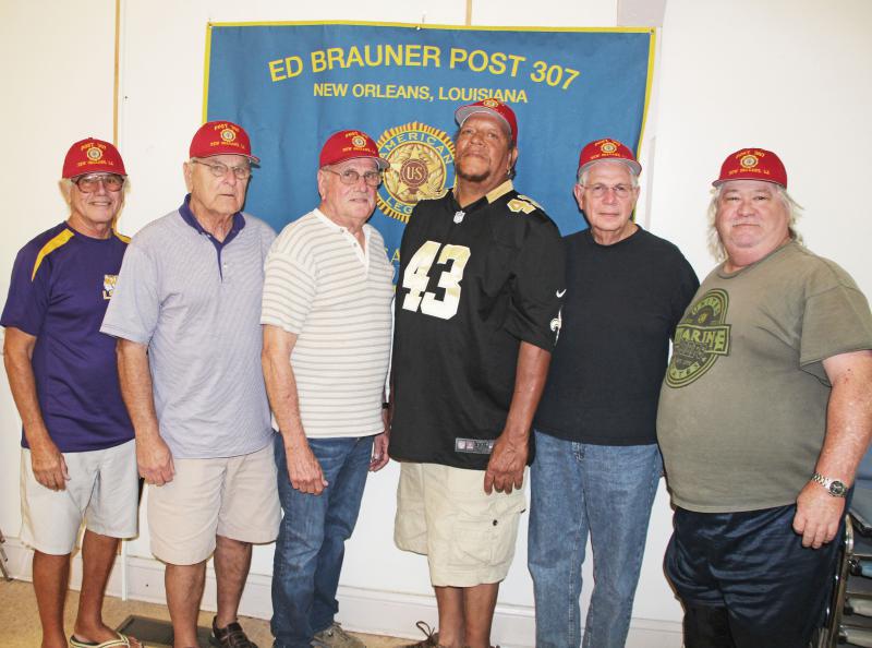 2015. August Post Meeting. Members attending Post Meeting and receiving their Red Legion Baseball Caps. 