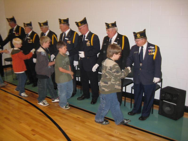 Elementary School Children Thanking Post Veterans For Their Service