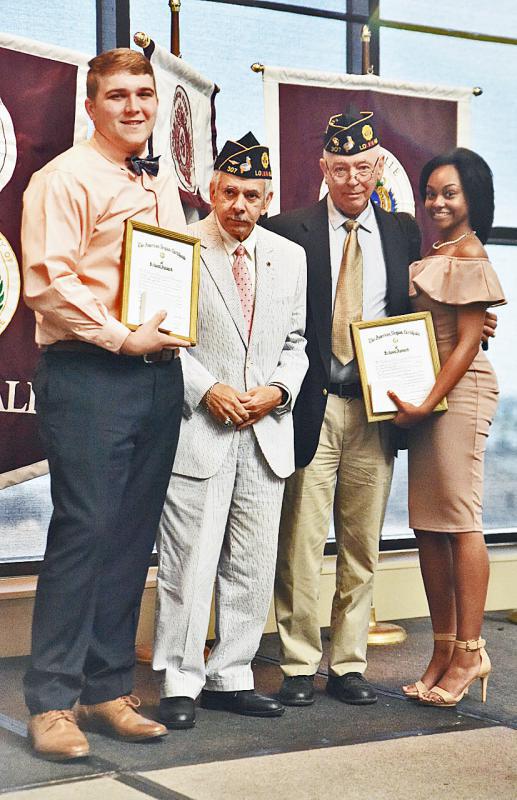 2017-05/06. Post 307 presents the American Legion National Americanism Commission School Award to De La Salle High School Students in New Orleans La. 