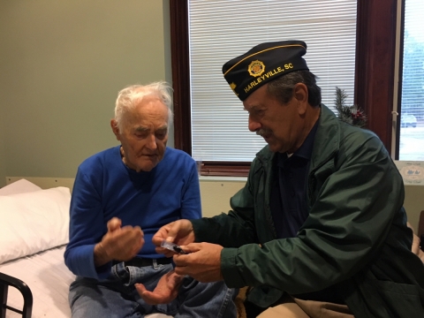 Post 128 Officers visit the Veterans Victory House