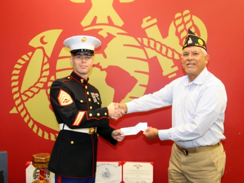2023-11-29. Post 307 makes a donation to the U..S. Marine Corps Toys for Tots program. 